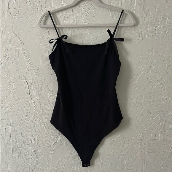 American Eagle Outfitters Tops - American Eagle Outfitters Black Spaghetti Strap Bodysuit w/ Bow Design